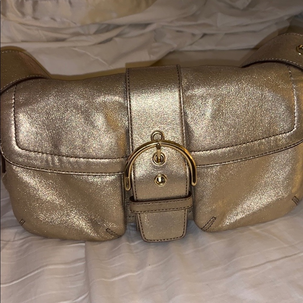 Gold coach shoulder bag